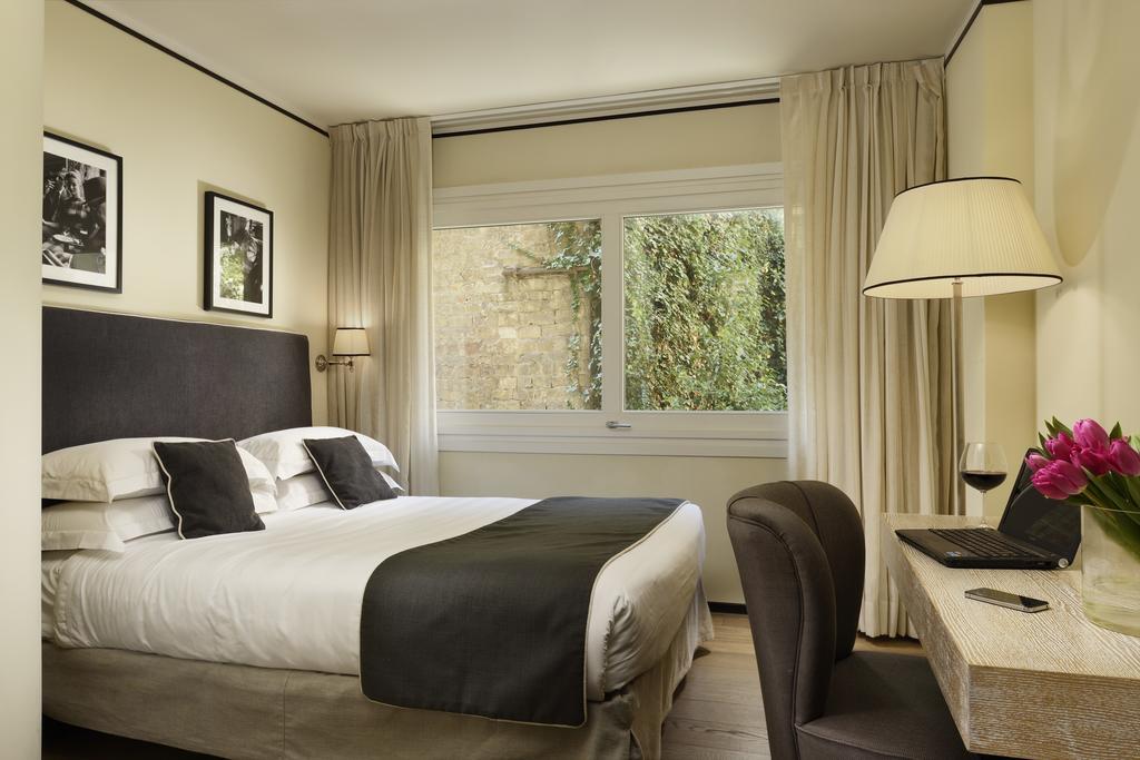 Ponte Vecchio Suites & Spa Флоренция Стая снимка